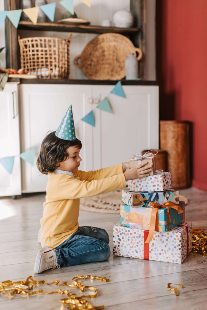 How to save money on kids birthday gifts by re-gifting unopened toys.